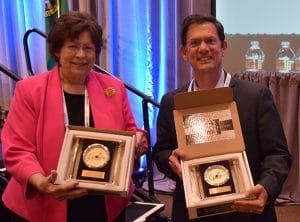 Washington state Reps. Marilyn Chase and Mark Miloscia show off the awards they received from the Washington State Legislative Board at the Seattle Regional Meeting.