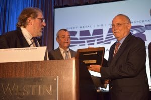 Washington state Sen. John Conway accepts his Golden Spike award from Washington State Legislative Director Herb Krohn, left, and SMART TD President John Previsich, center, at the Seattle Regional Meeting.