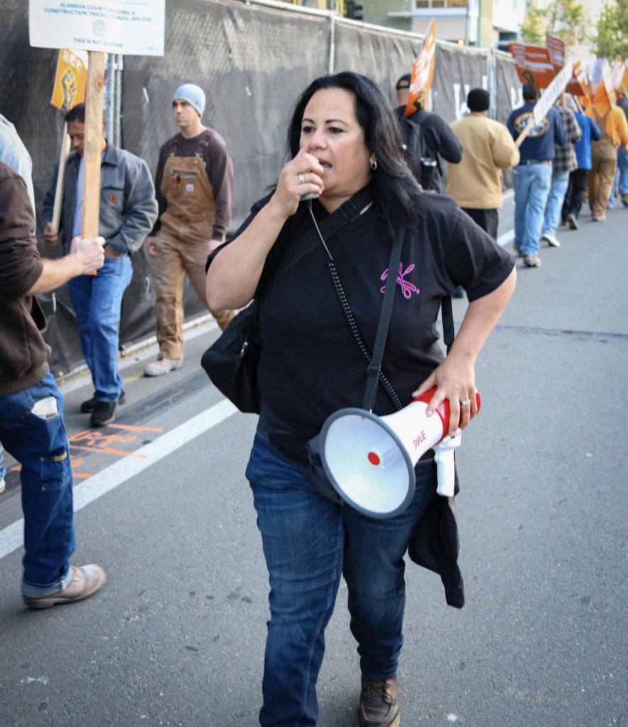 Alicia Mijares, first woman business representative at Local 104, on the picket line.
